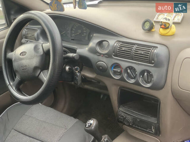 Зеленый Форд Эскорт, объемом двигателя 1.8 л и пробегом 216 тыс. км за 1900 $, фото 6 на Automoto.ua