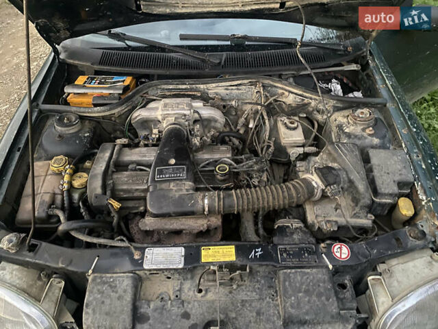 Зеленый Форд Эскорт, объемом двигателя 1.6 л и пробегом 210 тыс. км за 900 $, фото 2 на Automoto.ua