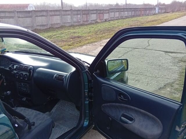 Зелений Форд Ескорт, об'ємом двигуна 1.3 л та пробігом 290 тис. км за 1650 $, фото 8 на Automoto.ua