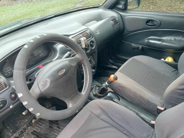 Зеленый Форд Эскорт, объемом двигателя 1.6 л и пробегом 300 тыс. км за 2200 $, фото 4 на Automoto.ua