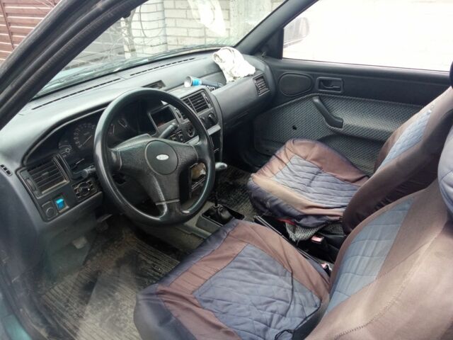 Зеленый Форд Эскорт, объемом двигателя 1.4 л и пробегом 100 тыс. км за 300 $, фото 2 на Automoto.ua