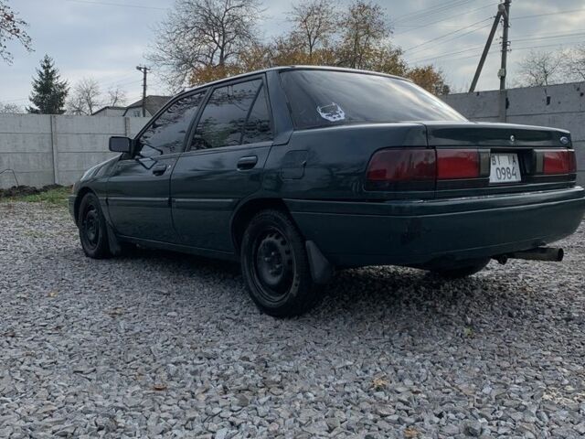 Зеленый Форд Эскорт, объемом двигателя 1.9 л и пробегом 251 тыс. км за 2000 $, фото 3 на Automoto.ua