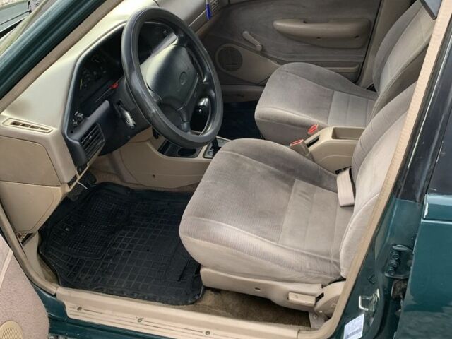 Зеленый Форд Эскорт, объемом двигателя 1.9 л и пробегом 251 тыс. км за 2000 $, фото 9 на Automoto.ua