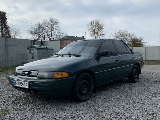 Зеленый Форд Эскорт, объемом двигателя 1.9 л и пробегом 251 тыс. км за 2000 $, фото 1 на Automoto.ua