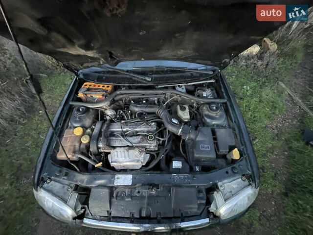 Зелений Форд Ескорт, об'ємом двигуна 1.8 л та пробігом 238 тис. км за 1600 $, фото 11 на Automoto.ua