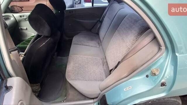 Зелений Форд Ескорт, об'ємом двигуна 2 л та пробігом 150 тис. км за 2000 $, фото 4 на Automoto.ua