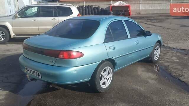 Зелений Форд Ескорт, об'ємом двигуна 2 л та пробігом 150 тис. км за 2000 $, фото 6 на Automoto.ua
