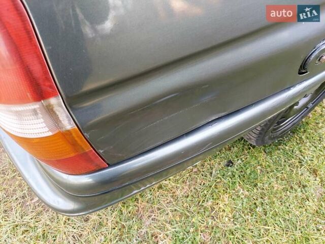 Зеленый Форд Эскорт, объемом двигателя 1.8 л и пробегом 436 тыс. км за 1999 $, фото 4 на Automoto.ua