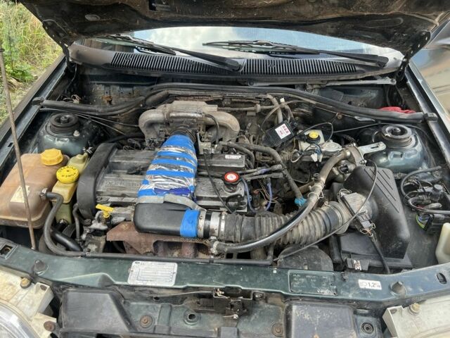 Зеленый Форд Эскорт, объемом двигателя 1.8 л и пробегом 2 тыс. км за 900 $, фото 7 на Automoto.ua