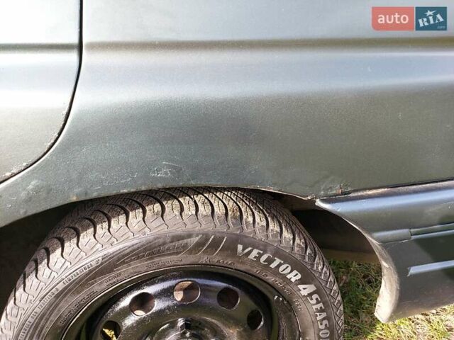 Зеленый Форд Эскорт, объемом двигателя 1.8 л и пробегом 436 тыс. км за 1999 $, фото 5 на Automoto.ua