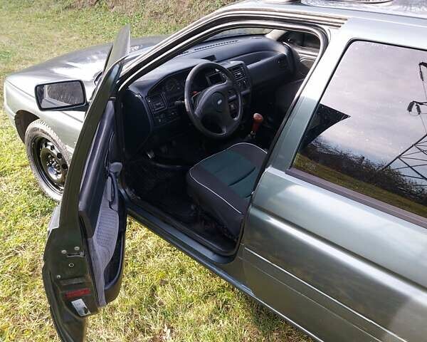 Зеленый Форд Эскорт, объемом двигателя 1.8 л и пробегом 436 тыс. км за 1999 $, фото 15 на Automoto.ua