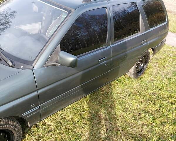 Зеленый Форд Эскорт, объемом двигателя 1.8 л и пробегом 436 тыс. км за 1999 $, фото 14 на Automoto.ua