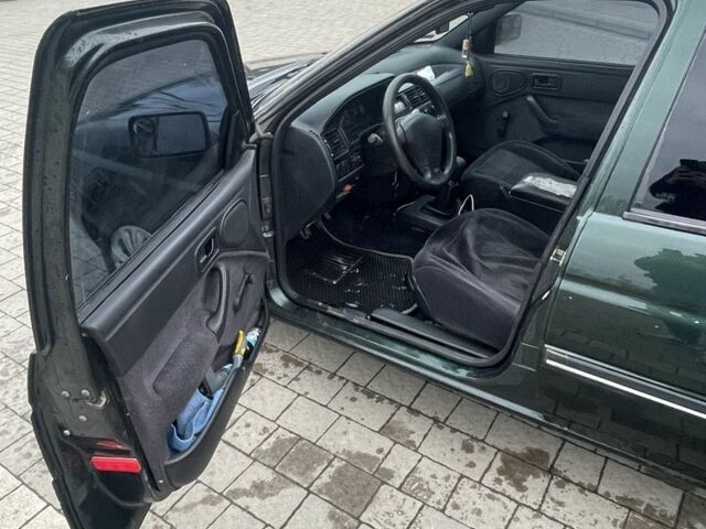 Зеленый Форд Эскорт, объемом двигателя 1.6 л и пробегом 321 тыс. км за 1211 $, фото 7 на Automoto.ua