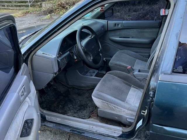 Зеленый Форд Эскорт, объемом двигателя 1.9 л и пробегом 450 тыс. км за 595 $, фото 6 на Automoto.ua