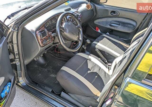 Зеленый Форд Эскорт, объемом двигателя 1.6 л и пробегом 217 тыс. км за 2000 $, фото 18 на Automoto.ua