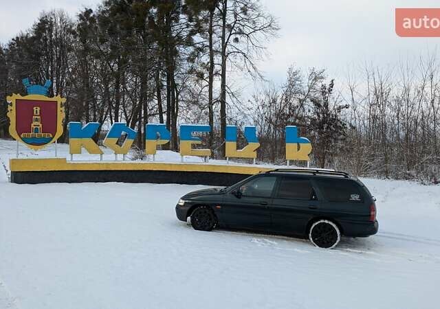 Зеленый Форд Эскорт, объемом двигателя 1.6 л и пробегом 217 тыс. км за 2000 $, фото 2 на Automoto.ua