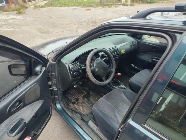 Зеленый Форд Эскорт, объемом двигателя 1.6 л и пробегом 220 тыс. км за 1100 $, фото 6 на Automoto.ua