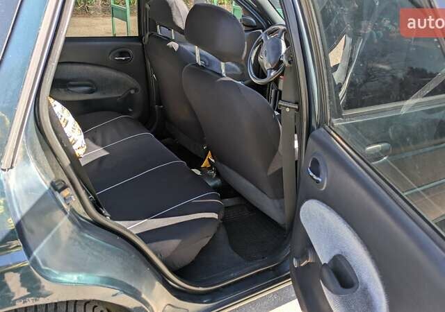 Зеленый Форд Эскорт, объемом двигателя 1.6 л и пробегом 217 тыс. км за 2000 $, фото 24 на Automoto.ua