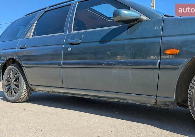 Зеленый Форд Эскорт, объемом двигателя 1.6 л и пробегом 217 тыс. км за 2000 $, фото 5 на Automoto.ua