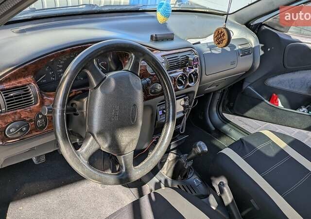 Зеленый Форд Эскорт, объемом двигателя 1.6 л и пробегом 217 тыс. км за 2000 $, фото 14 на Automoto.ua