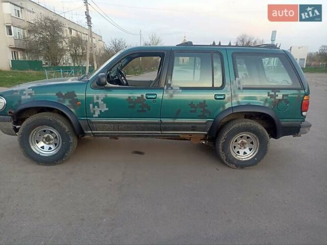 Зелений Форд Експлорер, об'ємом двигуна 4 л та пробігом 224 тис. км за 3500 $, фото 3 на Automoto.ua