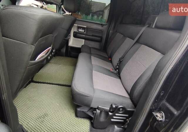 Черный Форд Ф-150, объемом двигателя 5.41 л и пробегом 247 тыс. км за 16000 $, фото 10 на Automoto.ua