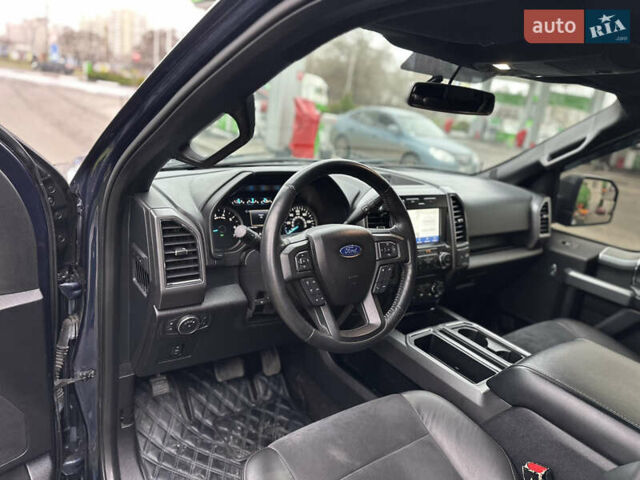 Синий Форд Ф-150, объемом двигателя 5 л и пробегом 220 тыс. км за 22900 $, фото 62 на Automoto.ua