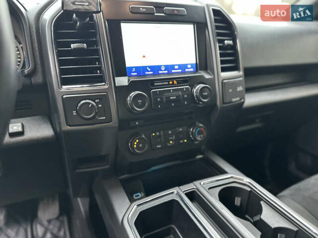 Синий Форд Ф-150, объемом двигателя 5 л и пробегом 220 тыс. км за 22900 $, фото 66 на Automoto.ua