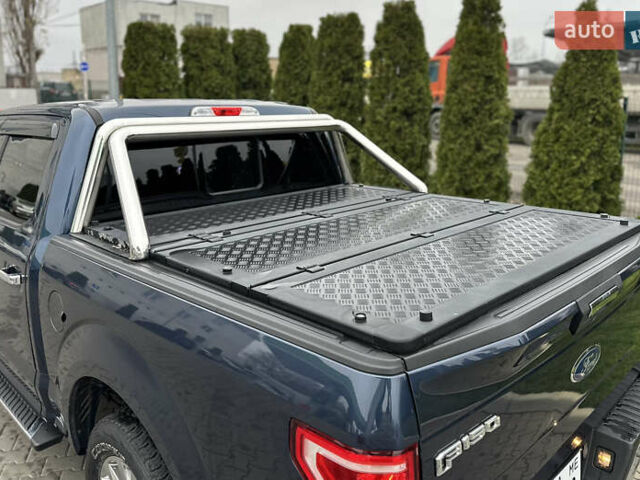 Синий Форд Ф-150, объемом двигателя 5 л и пробегом 220 тыс. км за 22900 $, фото 13 на Automoto.ua