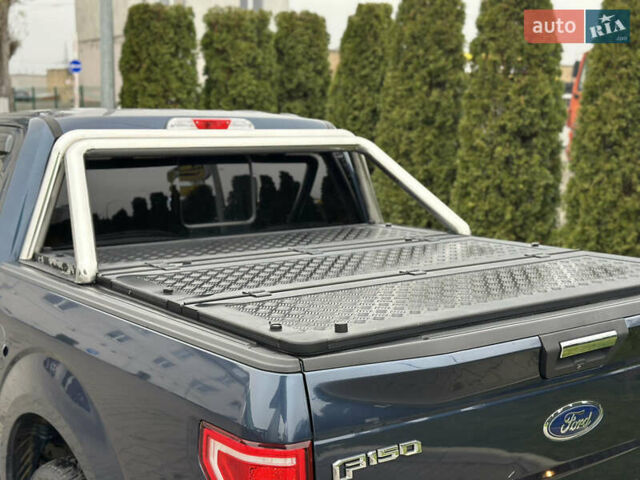 Синий Форд Ф-150, объемом двигателя 5 л и пробегом 220 тыс. км за 22900 $, фото 12 на Automoto.ua