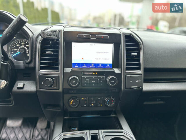 Синий Форд Ф-150, объемом двигателя 5 л и пробегом 220 тыс. км за 22900 $, фото 71 на Automoto.ua