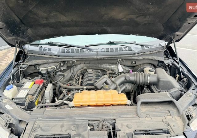 Синий Форд Ф-150, объемом двигателя 5 л и пробегом 222 тыс. км за 19900 $, фото 32 на Automoto.ua