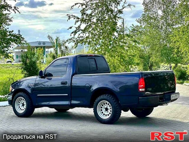 Синій Форд Ф-150, об'ємом двигуна 4.2 л та пробігом 0 тис. км за 12000 $, фото 7 на Automoto.ua