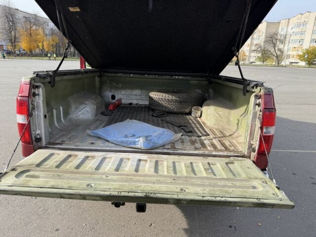 Красный Форд F-Series, объемом двигателя 5.4 л и пробегом 316 тыс. км за 8000 $, фото 10 на Automoto.ua