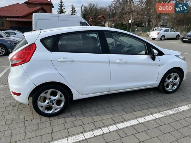 Білий Форд Фієста, об'ємом двигуна 1.4 л та пробігом 234 тис. км за 5000 $, фото 9 на Automoto.ua