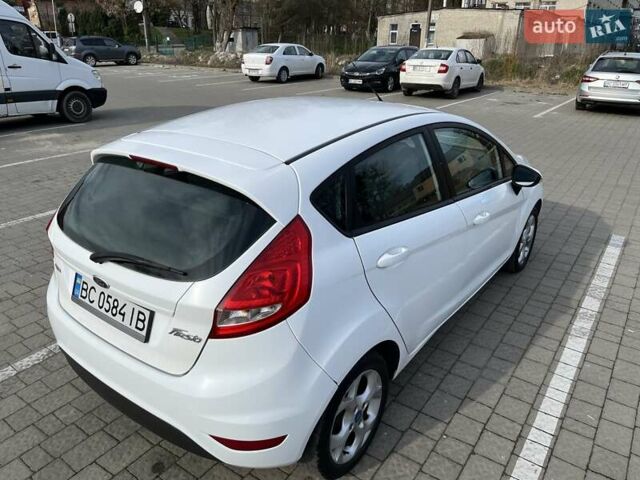 Білий Форд Фієста, об'ємом двигуна 1.4 л та пробігом 234 тис. км за 5000 $, фото 26 на Automoto.ua