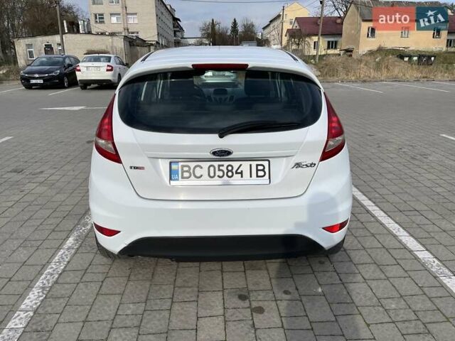 Білий Форд Фієста, об'ємом двигуна 1.4 л та пробігом 234 тис. км за 5000 $, фото 4 на Automoto.ua
