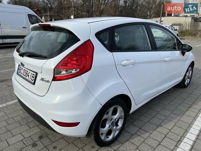 Білий Форд Фієста, об'ємом двигуна 1.4 л та пробігом 234 тис. км за 5000 $, фото 7 на Automoto.ua