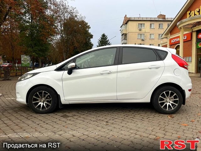 Белый Форд Фиеста, объемом двигателя 1.4 л и пробегом 220 тыс. км за 6350 $, фото 1 на Automoto.ua