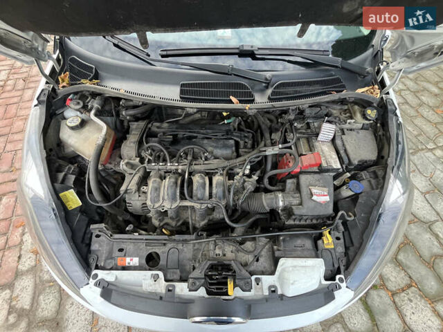 Білий Форд Фієста, об'ємом двигуна 1.39 л та пробігом 222 тис. км за 6800 $, фото 21 на Automoto.ua