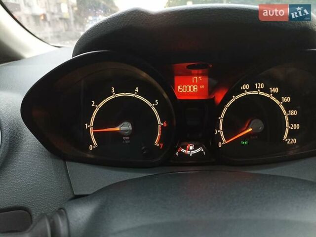 Белый Форд Фиеста, объемом двигателя 1.25 л и пробегом 150 тыс. км за 5000 $, фото 1 на Automoto.ua