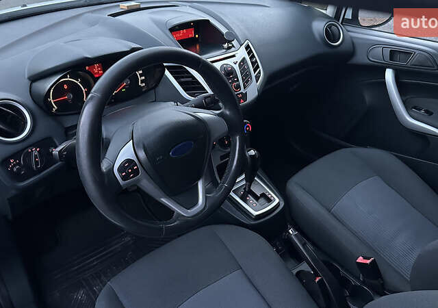 Белый Форд Фиеста, объемом двигателя 1.4 л и пробегом 220 тыс. км за 6950 $, фото 12 на Automoto.ua