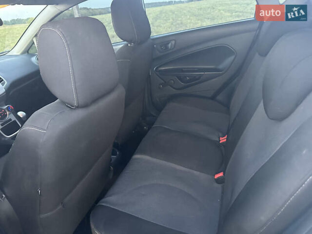Белый Форд Фиеста, объемом двигателя 1.24 л и пробегом 124 тыс. км за 5800 $, фото 17 на Automoto.ua