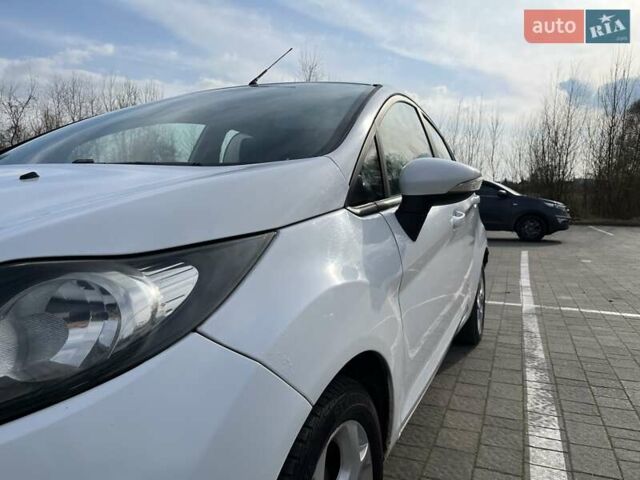 Білий Форд Фієста, об'ємом двигуна 1.4 л та пробігом 234 тис. км за 5000 $, фото 20 на Automoto.ua