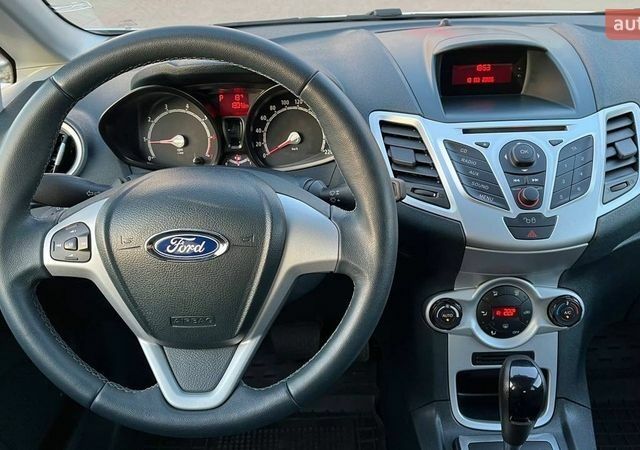 Білий Форд Фієста, об'ємом двигуна 1.4 л та пробігом 77 тис. км за 8200 $, фото 8 на Automoto.ua