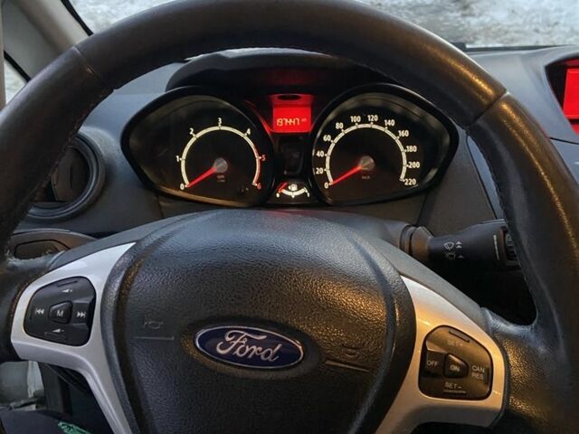 Білий Форд Фієста, об'ємом двигуна 1.4 л та пробігом 198 тис. км за 4499 $, фото 6 на Automoto.ua