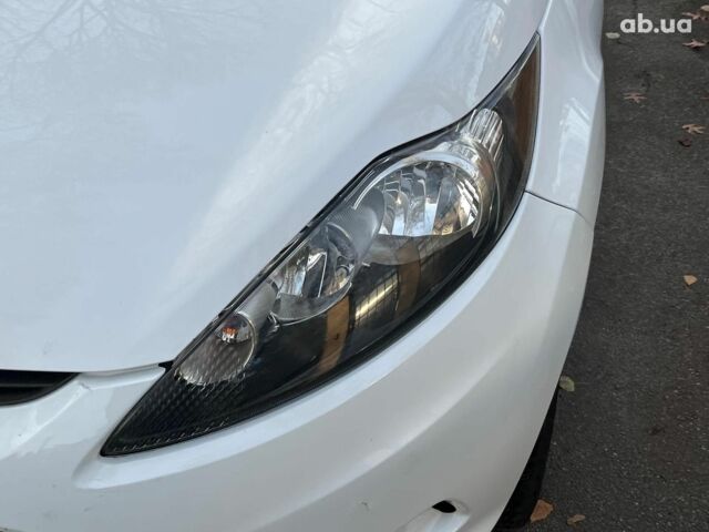 Белый Форд Фиеста, объемом двигателя 1.2 л и пробегом 170 тыс. км за 6290 $, фото 4 на Automoto.ua