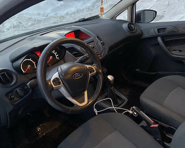 Белый Форд Фиеста, объемом двигателя 1.4 л и пробегом 198 тыс. км за 4399 $, фото 5 на Automoto.ua