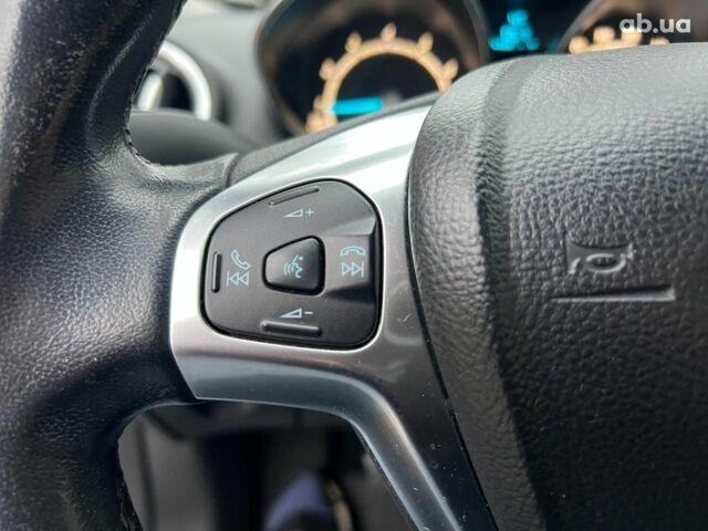 Белый Форд Фиеста, объемом двигателя 1 л и пробегом 151 тыс. км за 6940 $, фото 14 на Automoto.ua