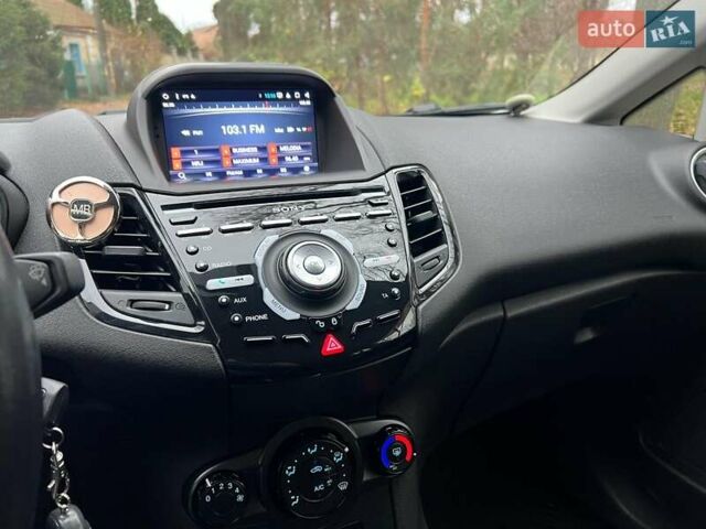 Белый Форд Фиеста, объемом двигателя 1 л и пробегом 151 тыс. км за 6940 $, фото 11 на Automoto.ua